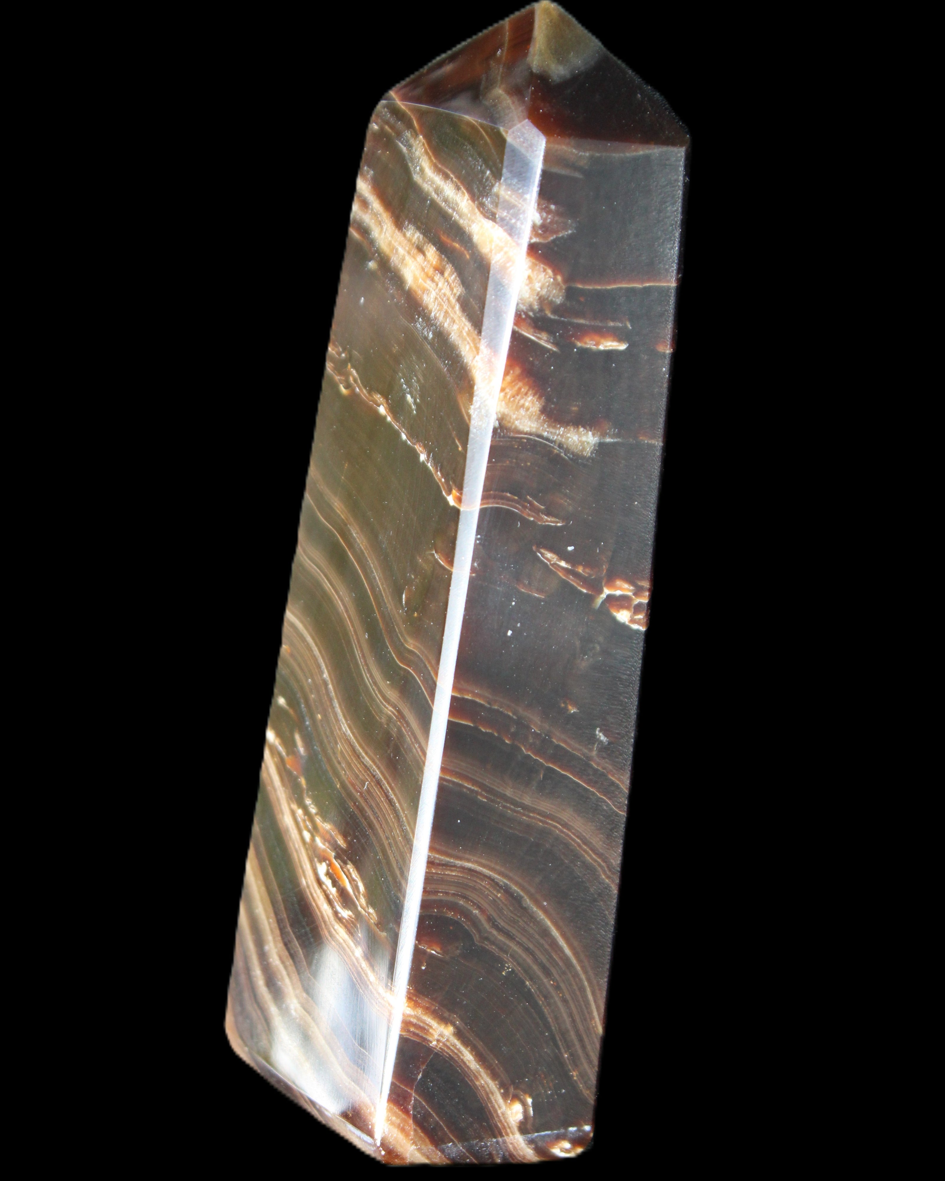Chocolate Calcite obelisk 107*33*23mm 197.5g in sunlight - Rocks and Things Store