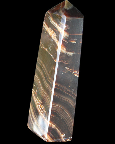 Chocolate Calcite obelisk 107*33*23mm 197.5g in sunlight - Rocks and Things Store