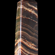 Chocolate Calcite obelisk 107*33*23mm 197.5g in sunlight - Rocks and Things Store