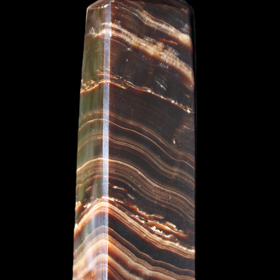 Chocolate Calcite obelisk 107*33*23mm 197.5g in sunlight - Rocks and Things Store