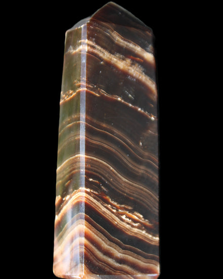 Chocolate Calcite obelisk 107*33*23mm 197.5g in sunlight - Rocks and Things Store