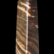 Chocolate Calcite obelisk 107*33*23mm 197.5g in sunlight - Rocks and Things Store