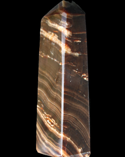 Chocolate Calcite obelisk 107*33*23mm 197.5g in sunlight - Rocks and Things Store
