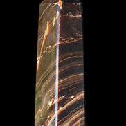 Chocolate Calcite obelisk 107*33*23mm 197.5g in sunlight - Rocks and Things Store