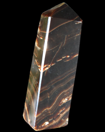 Chocolate Calcite obelisk 107*33*23mm 197.5g in sunlight - Rocks and Things Store