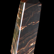 Chocolate Calcite obelisk 107*33*23mm 197.5g in sunlight - Rocks and Things Store