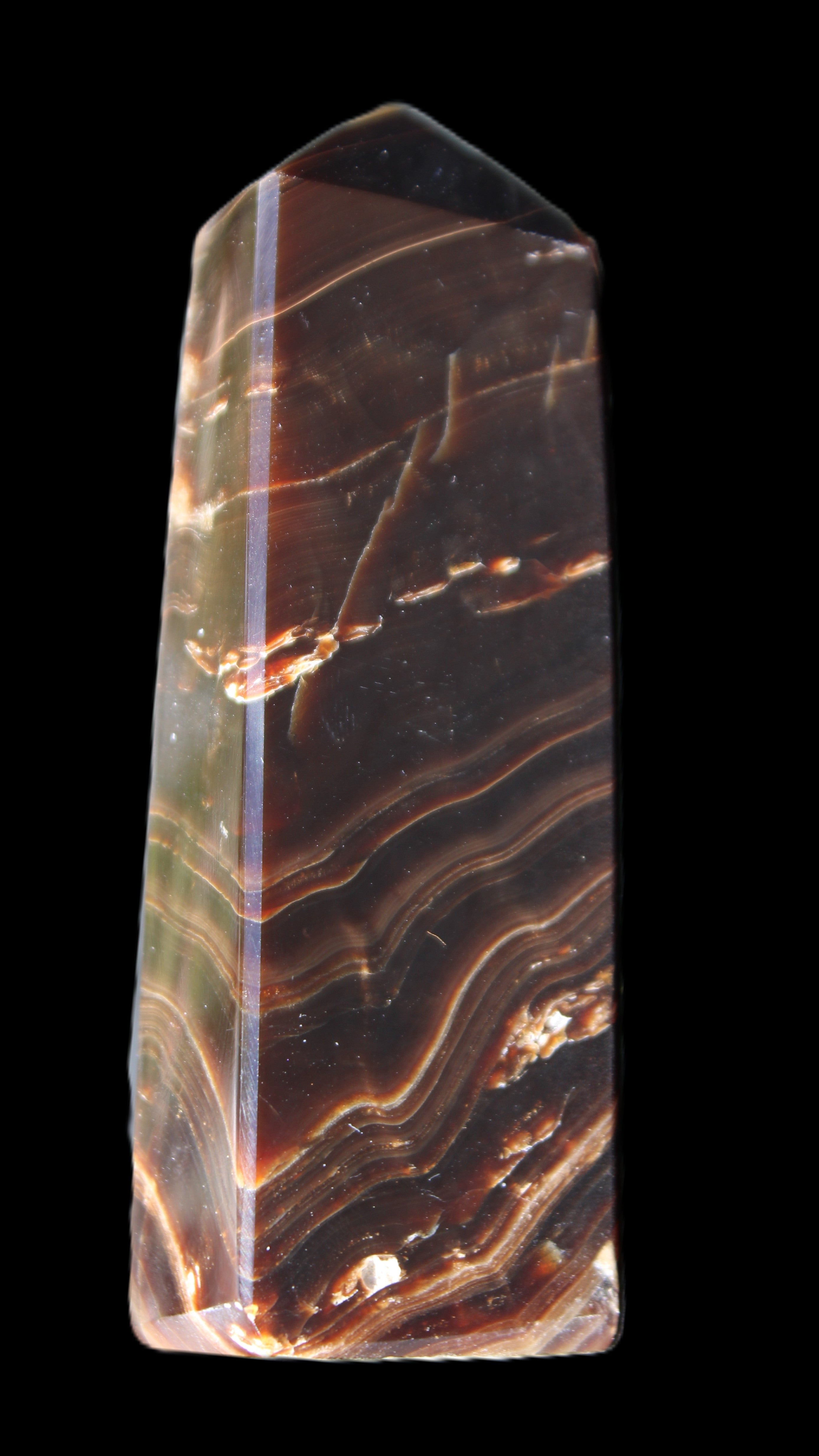Chocolate Calcite obelisk 107*33*23mm 197.5g in sunlight - Rocks and Things Store