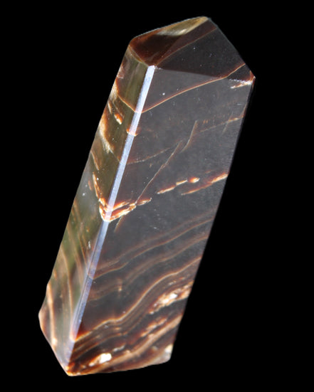Chocolate Calcite obelisk 107*33*23mm 197.5g in sunlight - Rocks and Things Store