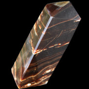 Chocolate Calcite obelisk 107*33*23mm 197.5g in sunlight - Rocks and Things Store