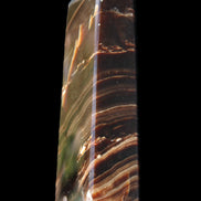 Chocolate Calcite obelisk 107*33*23mm 197.5g in sunlight - Rocks and Things Store