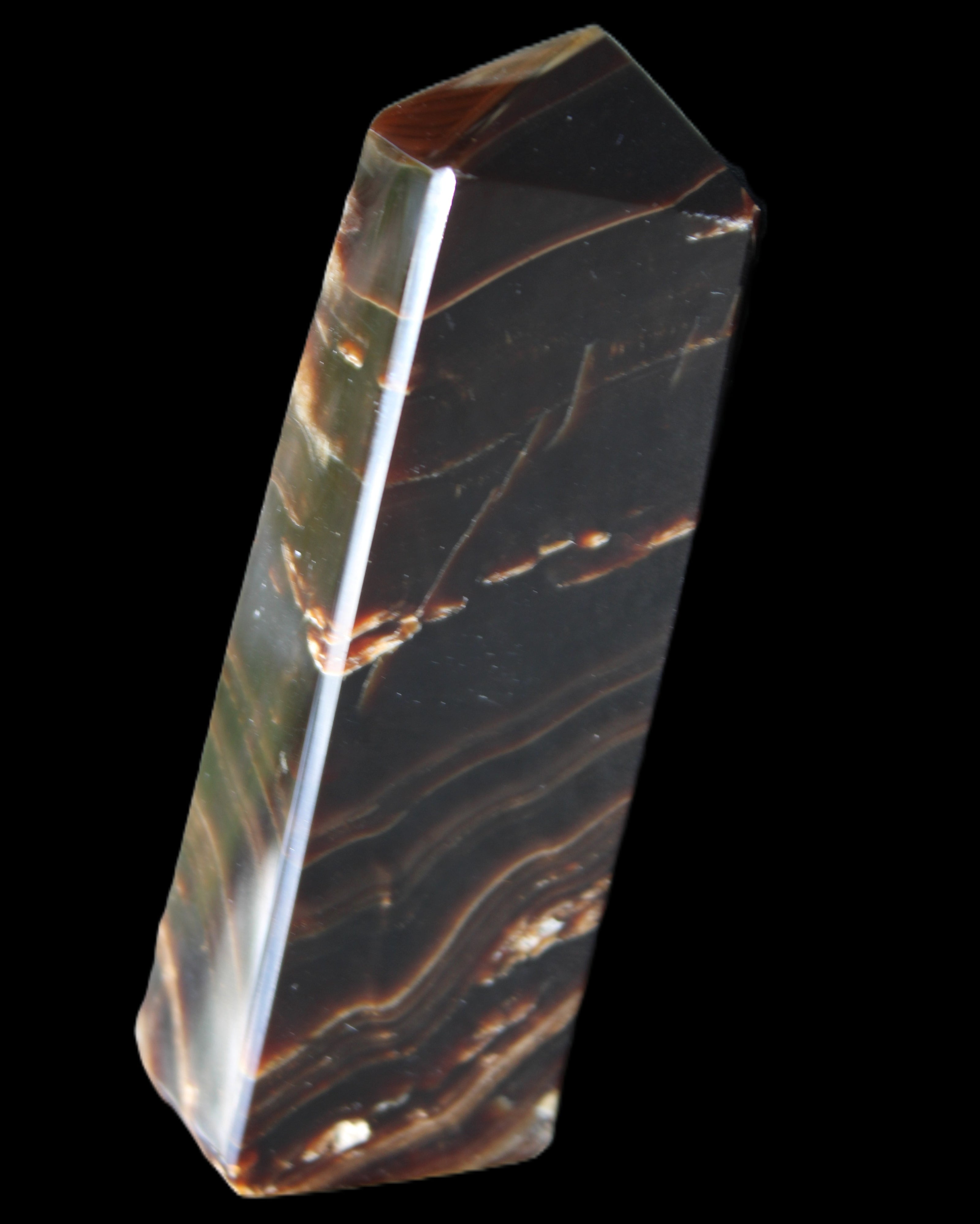 Chocolate Calcite obelisk 107*33*23mm 197.5g in sunlight - Rocks and Things Store