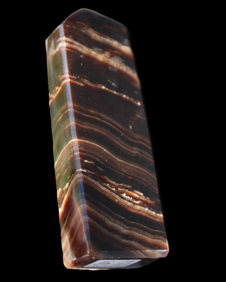 Chocolate Calcite obelisk 107*33*23mm 197.5g in sunlight - Rocks and Things Store