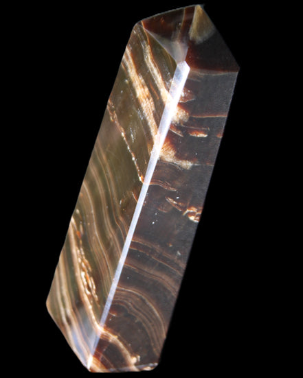 Chocolate Calcite obelisk 107*33*23mm 197.5g in sunlight - Rocks and Things Store