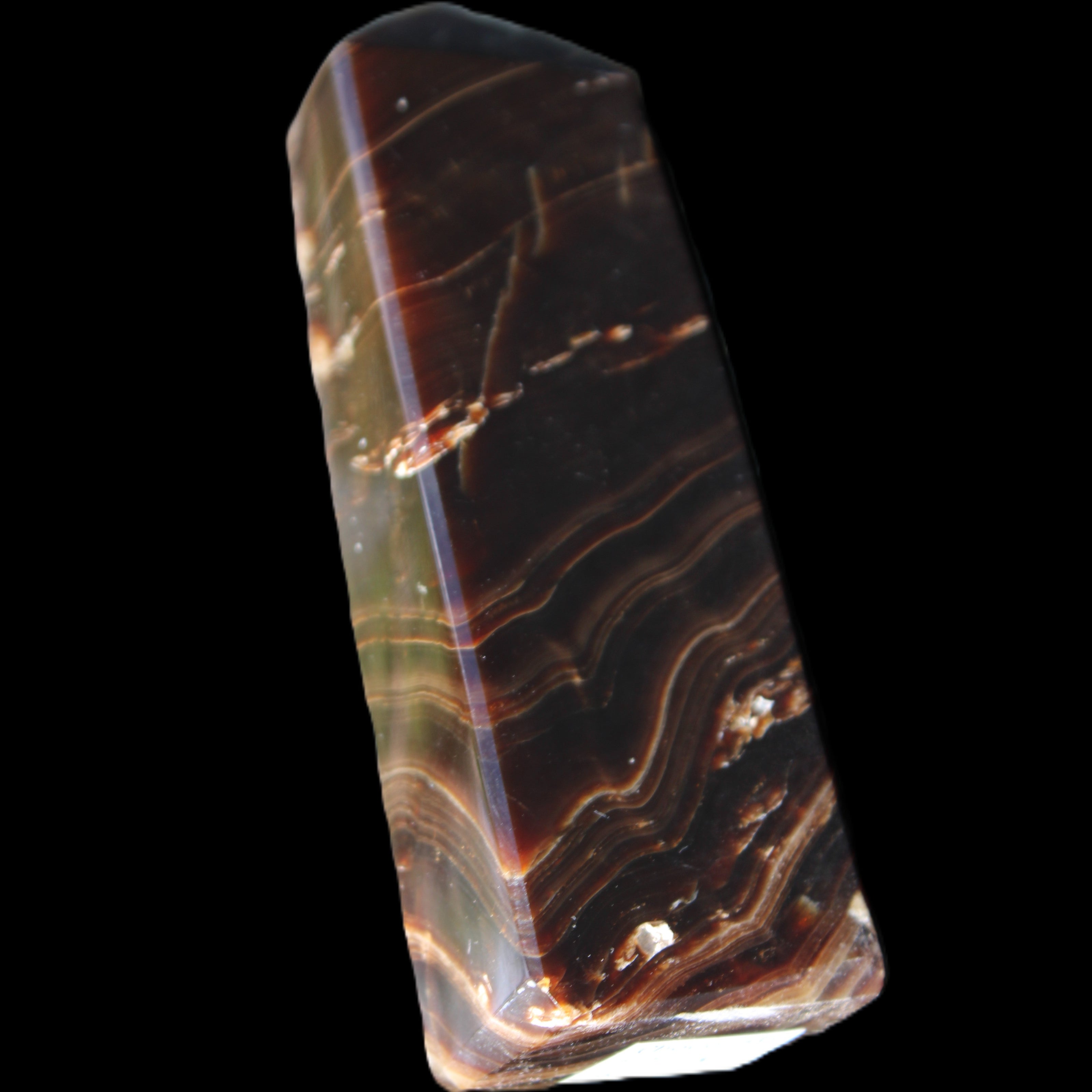 Chocolate Calcite obelisk 107*33*23mm 197.5g in sunlight - Rocks and Things Store