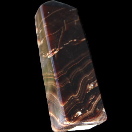 Chocolate Calcite obelisk 107*33*23mm 197.5g in sunlight - Rocks and Things Store