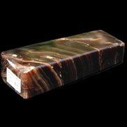 Chocolate Calcite obelisk 107*33*23mm 197.5g in sunlight - Rocks and Things Store