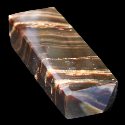 Chocolate Calcite obelisk 107*33*23mm 197.5g in sunlight - Rocks and Things Store