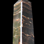 Chocolate Calcite obelisk 92*33*28mm 196g in sunlight - Rocks and Things Store