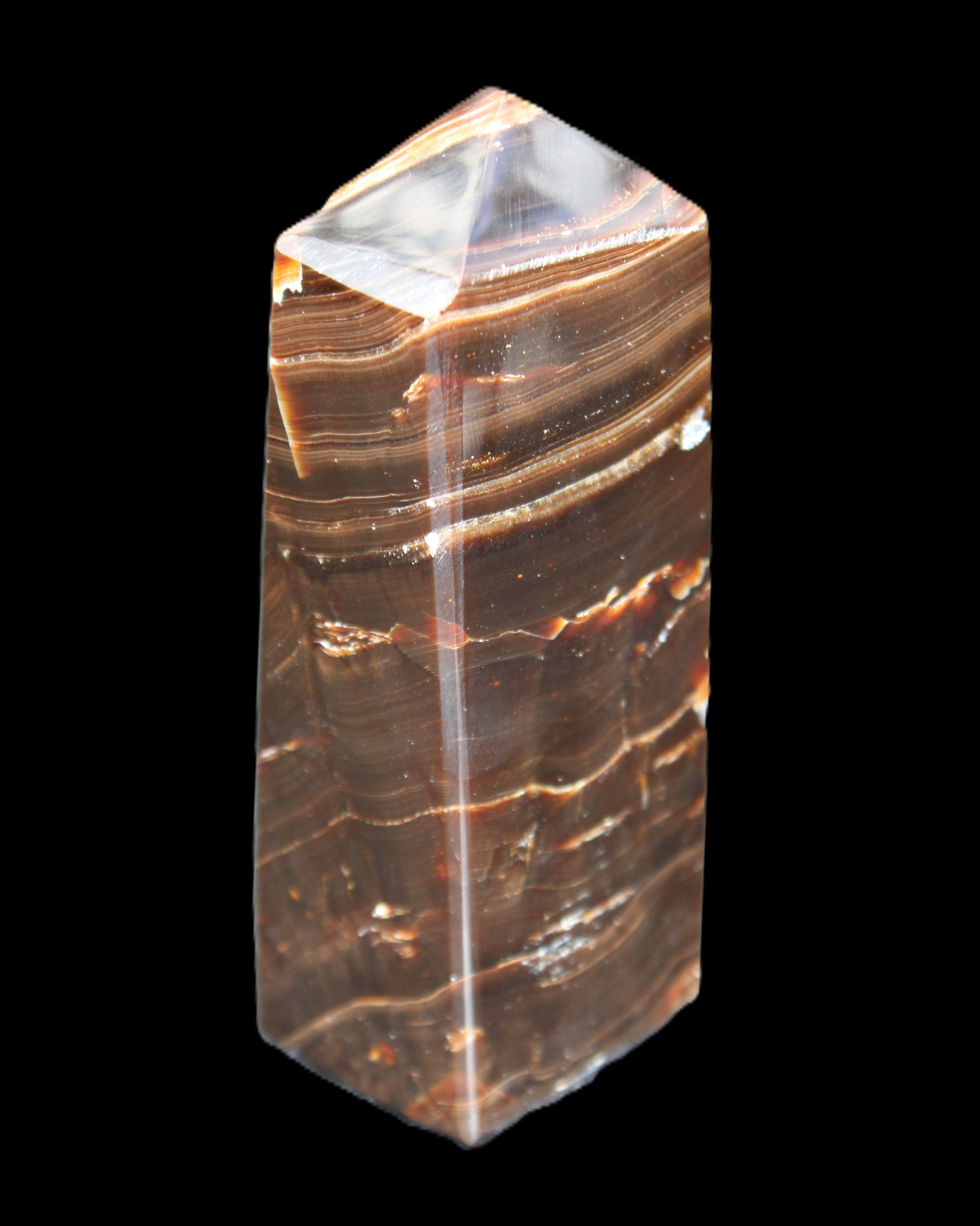 Chocolate Calcite obelisk 92*33*28mm 196g in sunlight - Rocks and Things Store