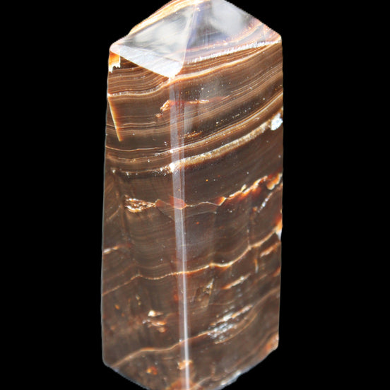 Chocolate Calcite obelisk 92*33*28mm 196g in sunlight - Rocks and Things Store