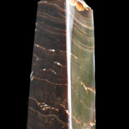 Chocolate Calcite obelisk 92*33*28mm 196g in sunlight - Rocks and Things Store