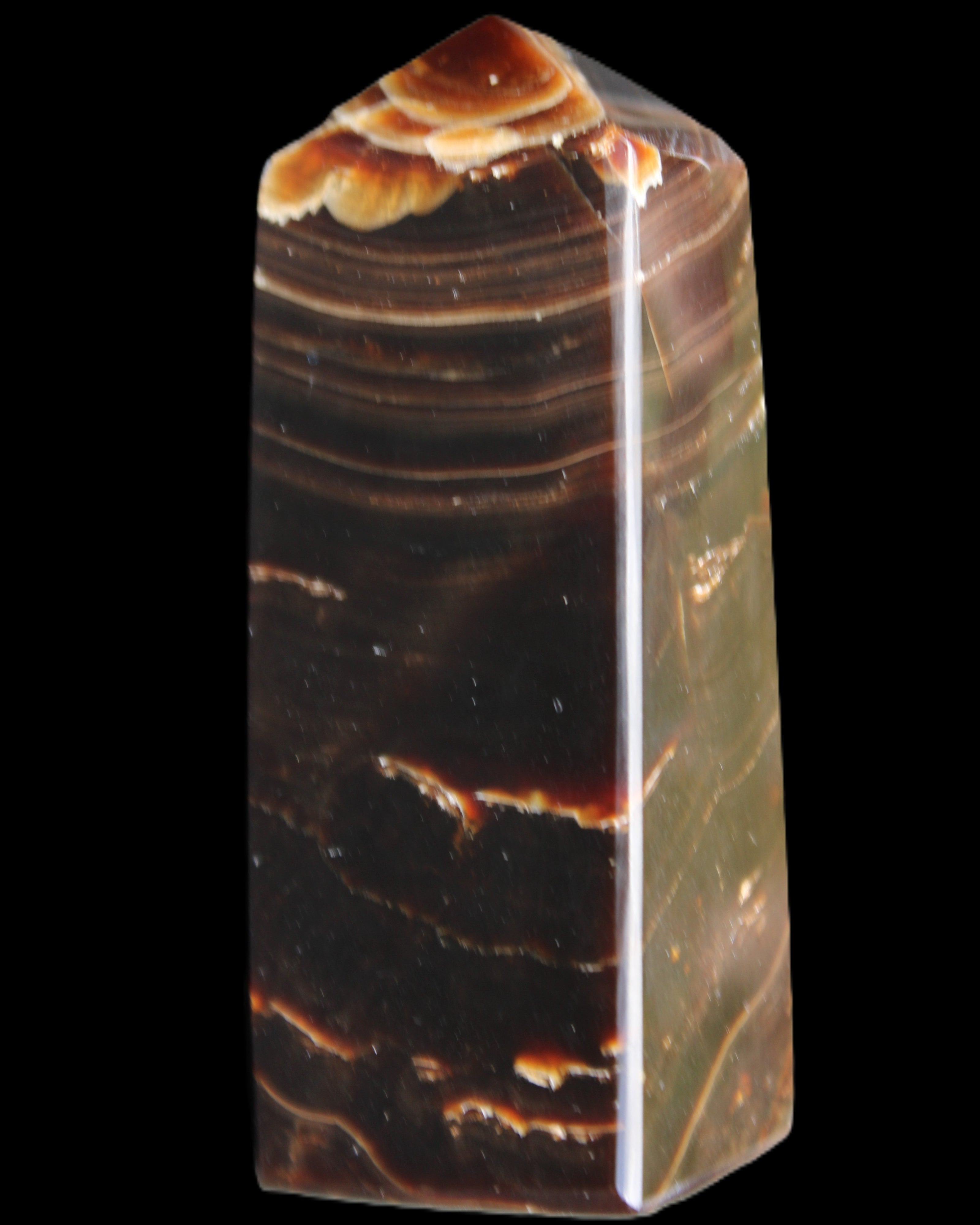Chocolate Calcite obelisk 92*33*28mm 196g in sunlight - Rocks and Things Store
