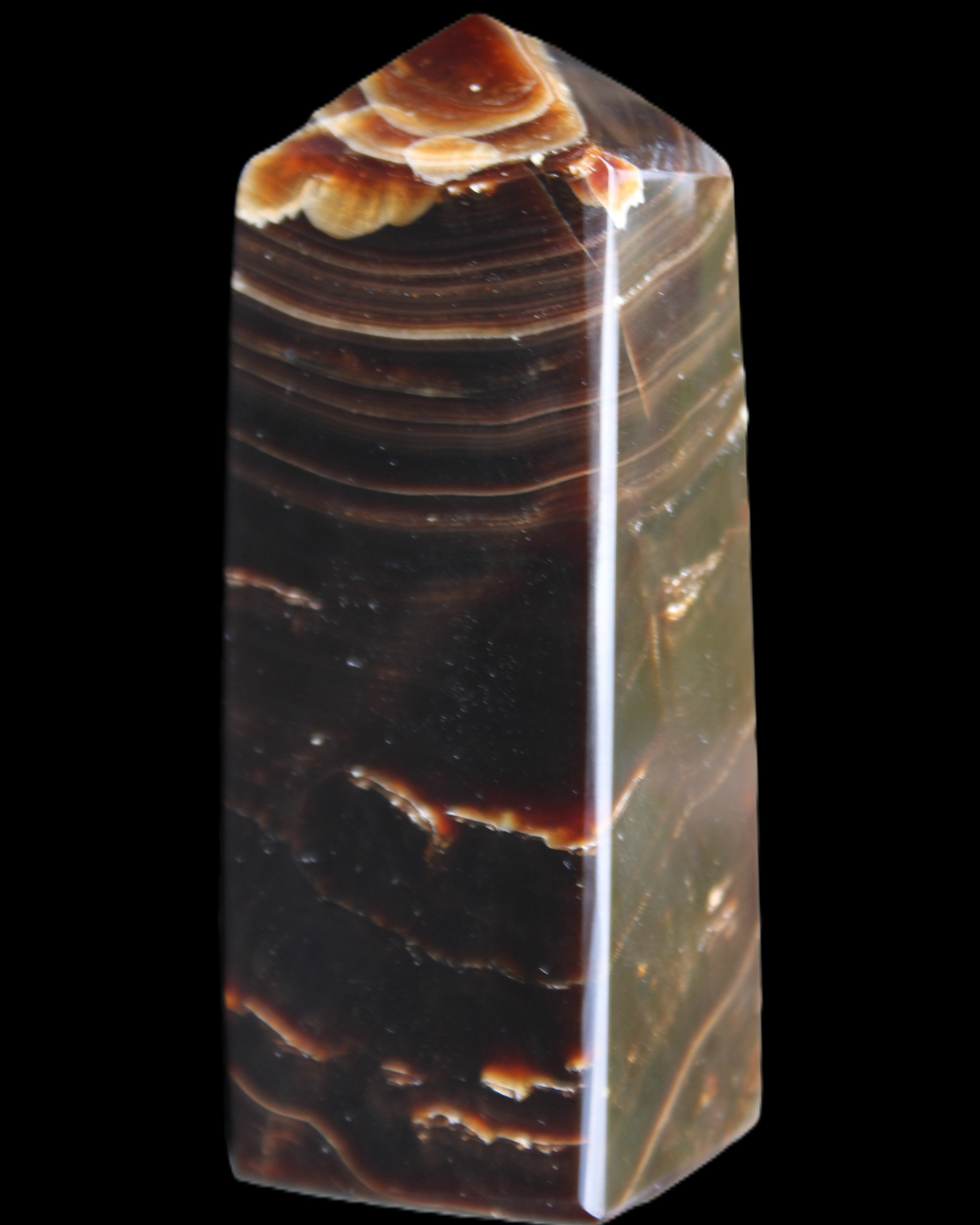 Chocolate Calcite obelisk 92*33*28mm 196g in sunlight - Rocks and Things Store