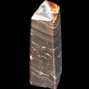 Chocolate Calcite obelisk 92*33*28mm 196g in sunlight - Rocks and Things Store