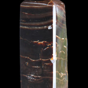 Chocolate Calcite obelisk 92*33*28mm 196g in sunlight - Rocks and Things Store