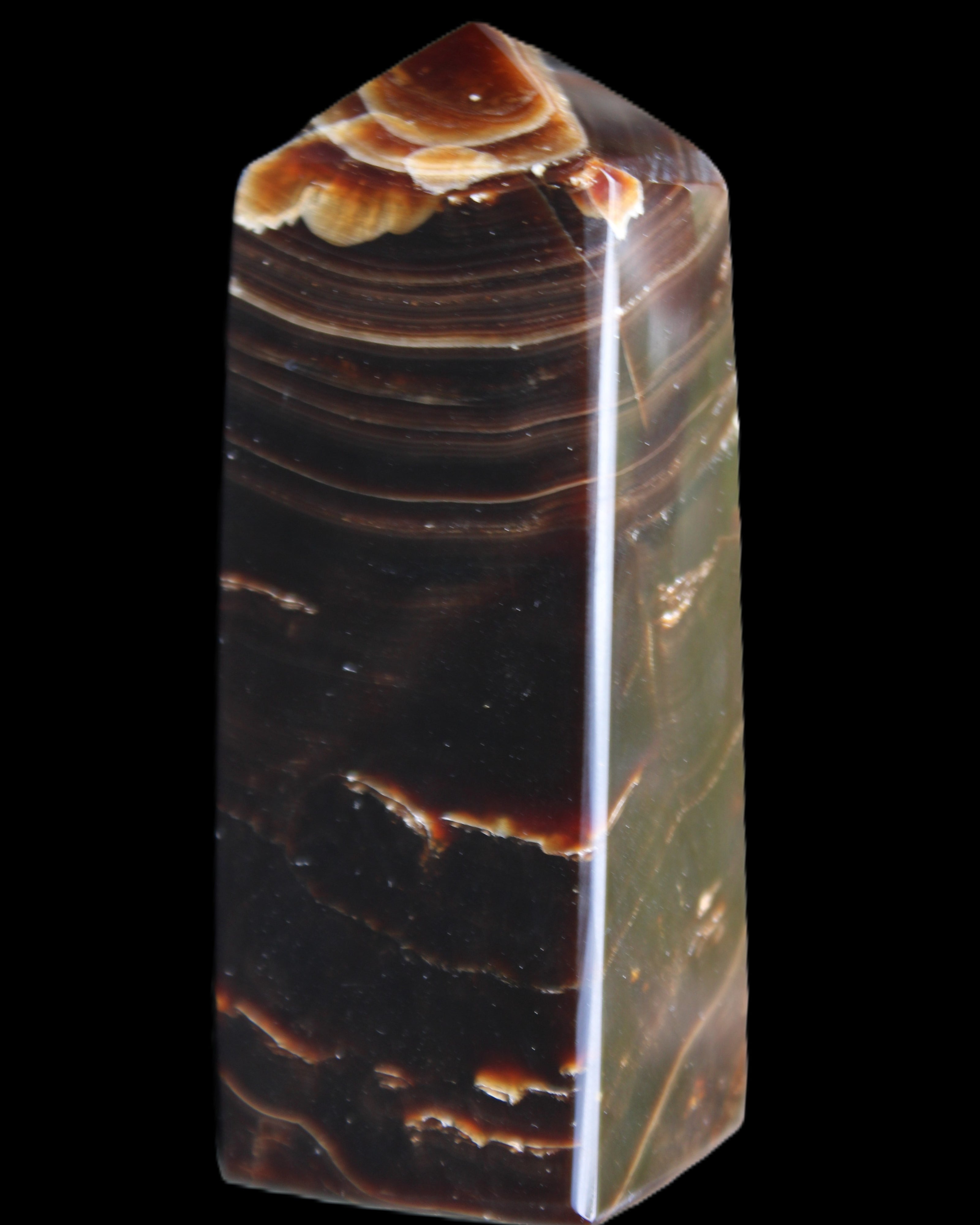 Chocolate Calcite obelisk 92*33*28mm 196g in sunlight - Rocks and Things Store