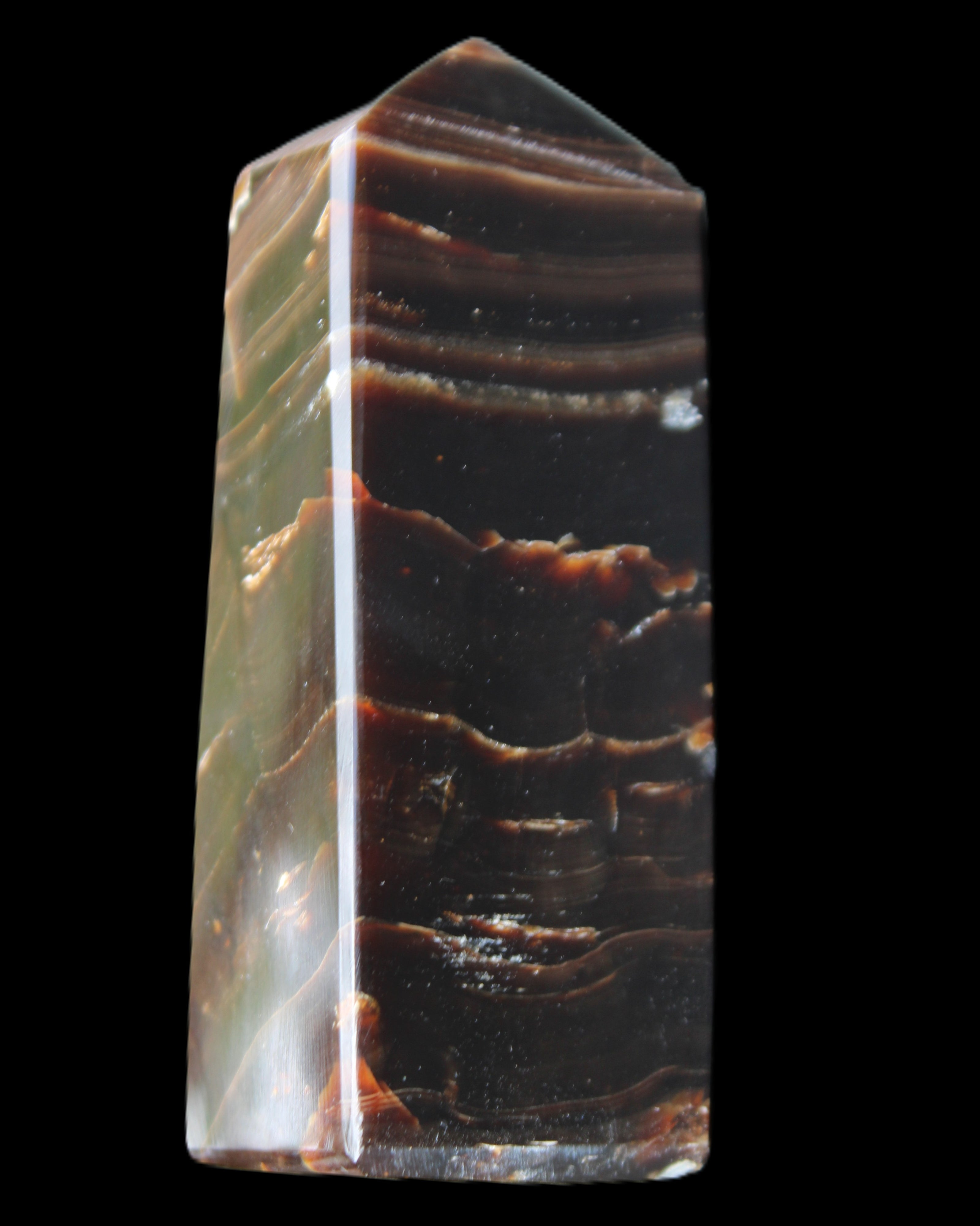Chocolate Calcite obelisk 92*33*28mm 196g in sunlight - Rocks and Things Store