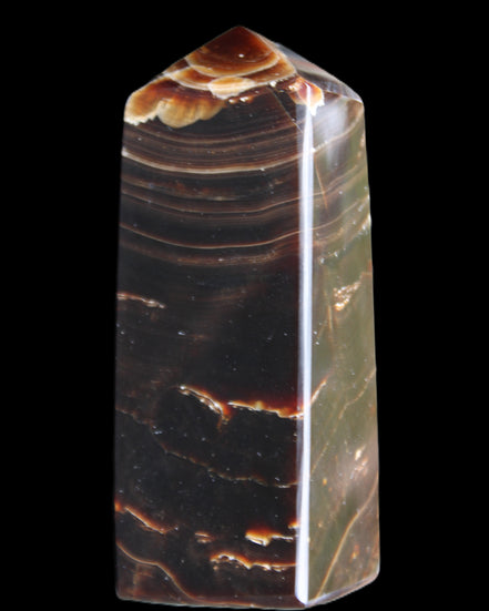 Chocolate Calcite obelisk 92*33*28mm 196g in sunlight - Rocks and Things Store
