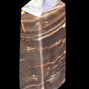 Chocolate Calcite obelisk 92*33*28mm 196g in sunlight - Rocks and Things Store
