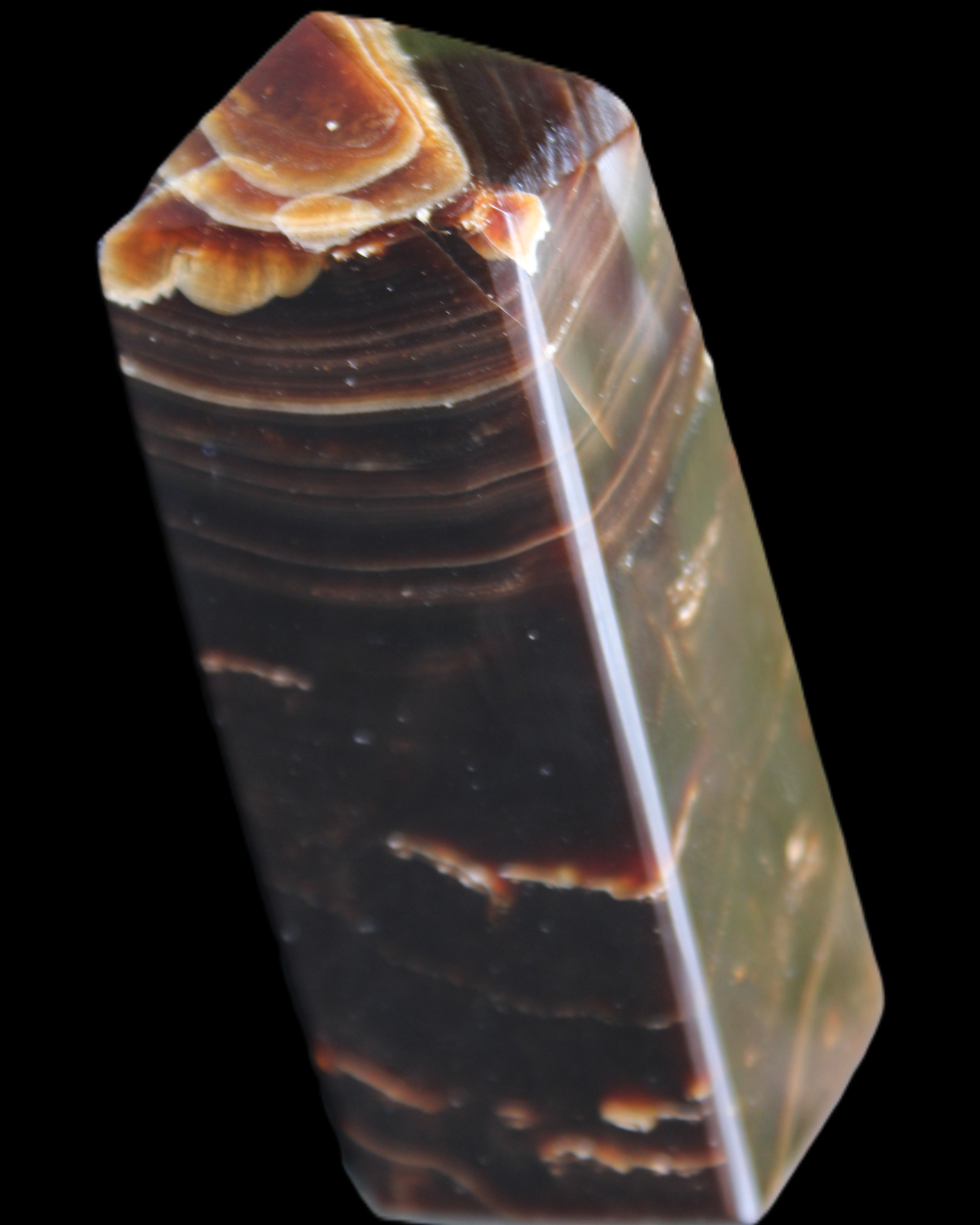 Chocolate Calcite obelisk 92*33*28mm 196g in sunlight - Rocks and Things Store