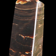 Chocolate Calcite obelisk 92*33*28mm 196g in sunlight - Rocks and Things Store