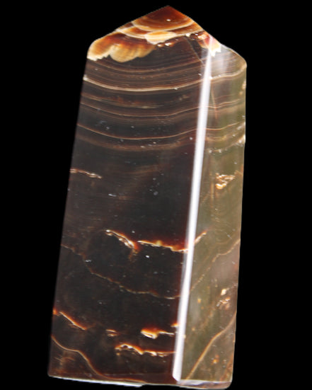 Chocolate Calcite obelisk 92*33*28mm 196g in sunlight - Rocks and Things Store