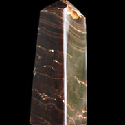 Chocolate Calcite obelisk 92*33*28mm 196g in sunlight - Rocks and Things Store