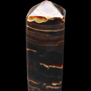 Chocolate Calcite obelisk 92*33*28mm 196g in sunlight - Rocks and Things Store