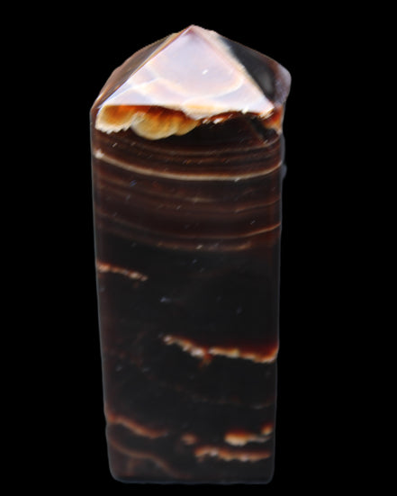Chocolate Calcite obelisk 92*33*28mm 196g in sunlight - Rocks and Things Store