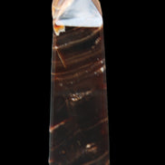 Chocolate Calcite obelisk 92*33*28mm 196g in sunlight - Rocks and Things Store