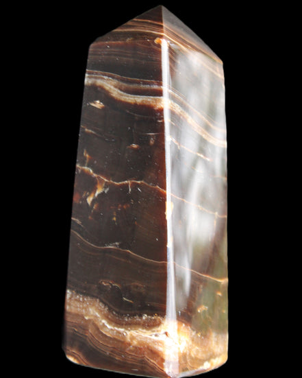 Chocolate Calcite obelisk 94*32*31mm 218g in sunlight - Rocks and Things Store