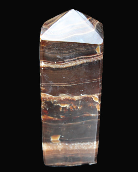 Chocolate Calcite obelisk 94*32*31mm 218g in sunlight - Rocks and Things Store