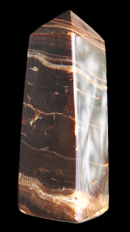 Chocolate Calcite obelisk 94*32*31mm 218g in sunlight - Rocks and Things Store