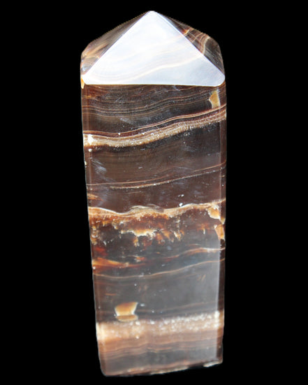 Chocolate Calcite obelisk 94*32*31mm 218g in sunlight - Rocks and Things Store
