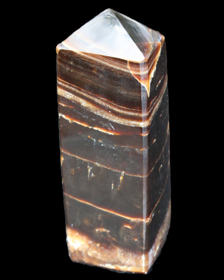 Chocolate Calcite obelisk 94*32*31mm 218g in sunlight - Rocks and Things Store