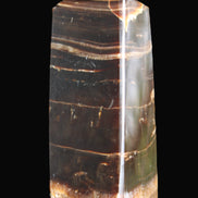 Chocolate Calcite obelisk 94*32*31mm 218g in sunlight - Rocks and Things Store