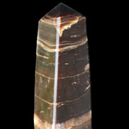 Chocolate Calcite obelisk 94*32*31mm 218g in sunlight - Rocks and Things Store