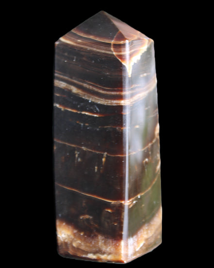 Chocolate Calcite obelisk 94*32*31mm 218g in sunlight - Rocks and Things Store