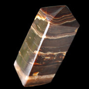 Chocolate Calcite obelisk 94*32*31mm 218g in sunlight - Rocks and Things Store