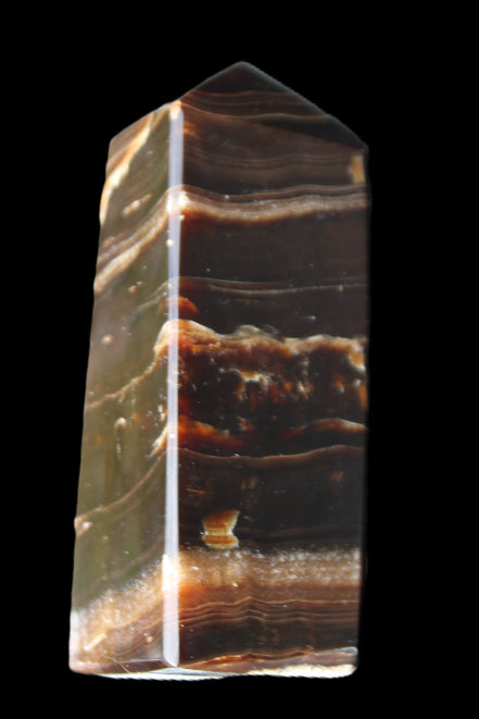 Chocolate Calcite obelisk 94*32*31mm 218g in sunlight - Rocks and Things Store